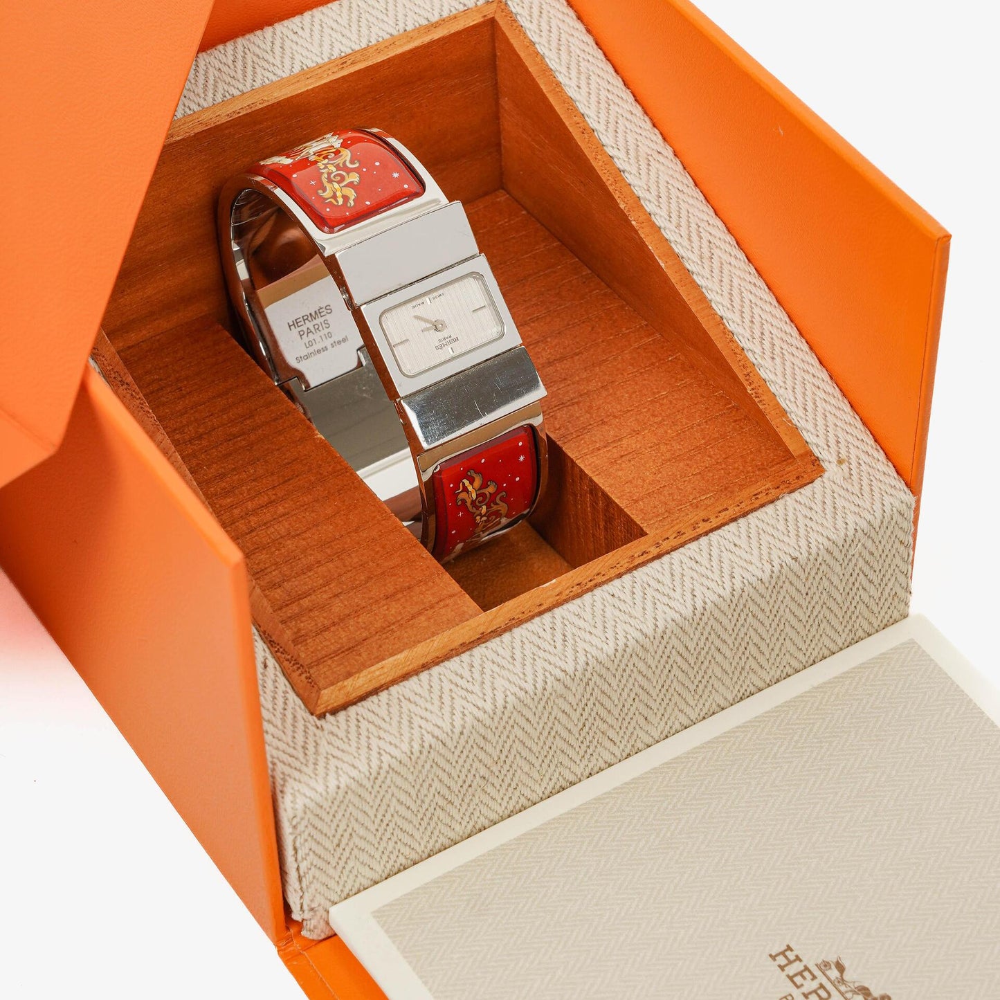 Hermès Loquet Armreif-Quarzuhr in Rot und Silber L01.110