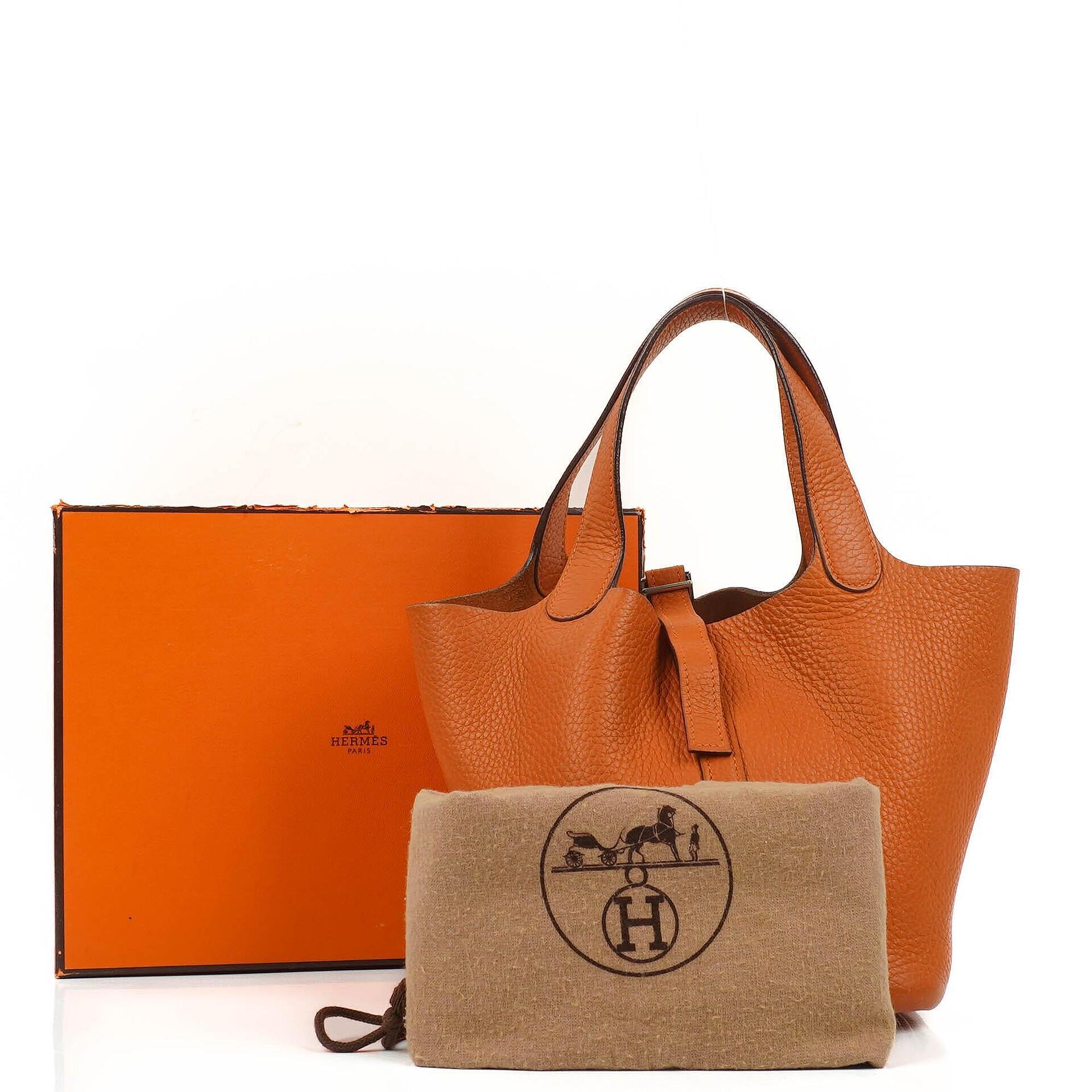 Hermès Picotin 18 PM Bucket Tasche aus orangefarbenem Taurillon Clemence