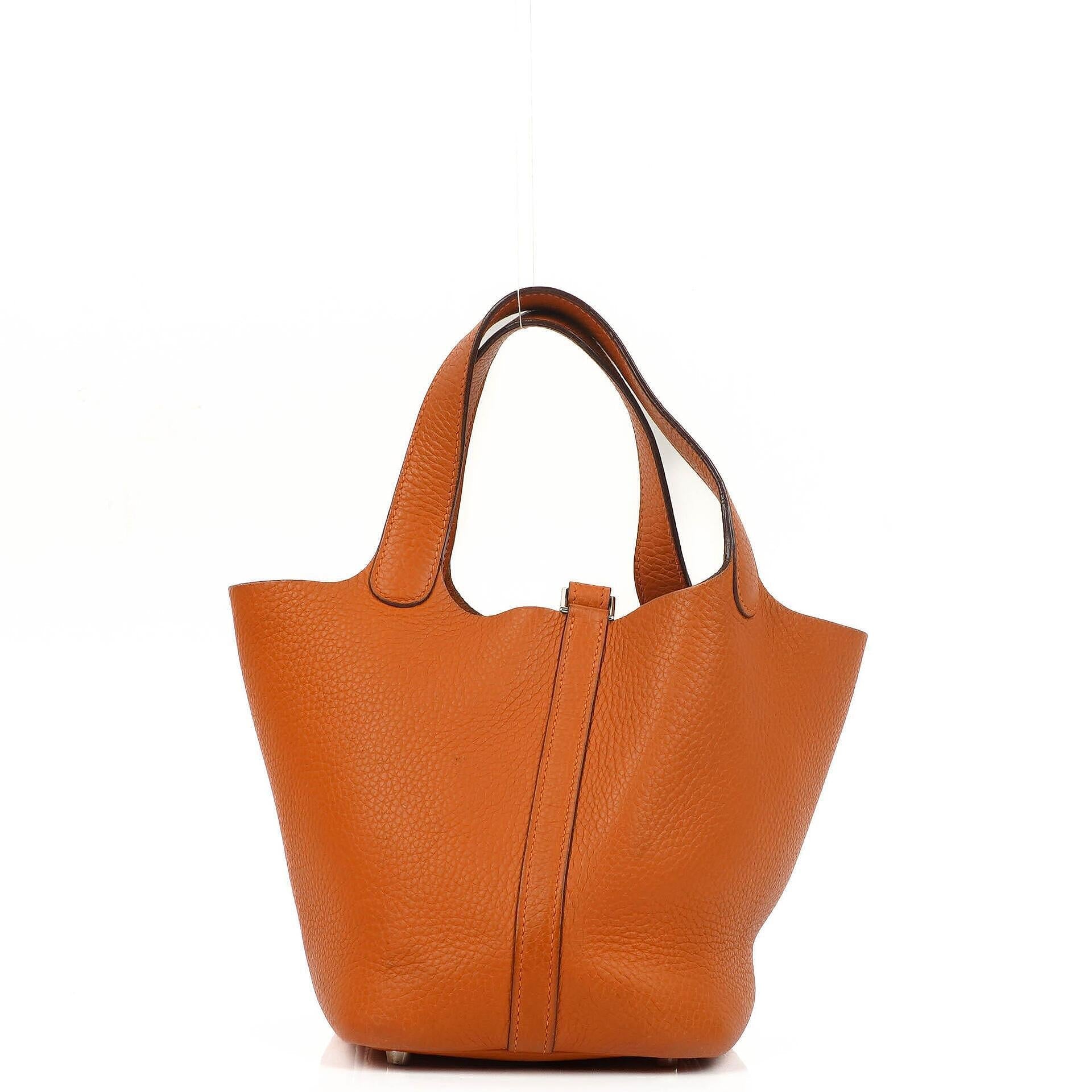 Hermès Picotin 18 PM Bucket Tasche aus orangefarbenem Taurillon Clemence
