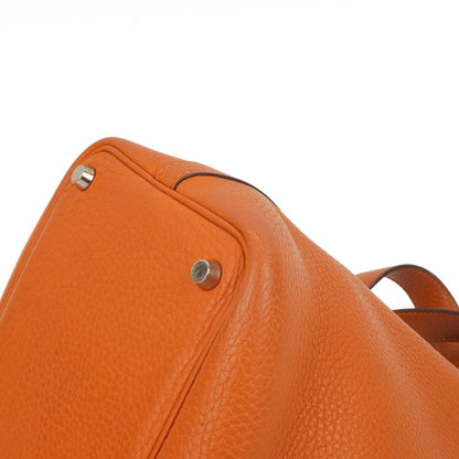 Hermès Picotin 18 PM Bucket Tasche aus orangefarbenem Taurillon Clemence