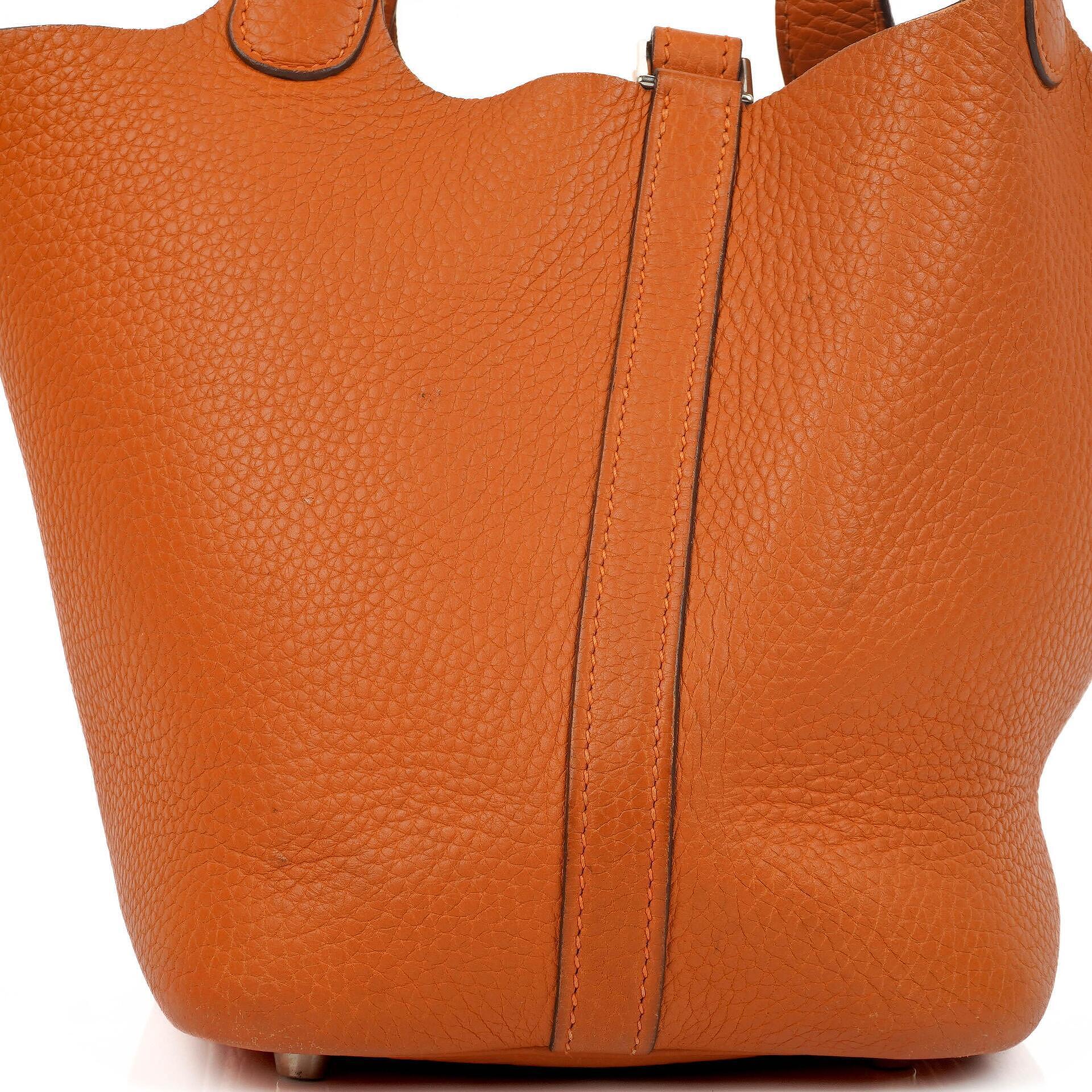 Hermès Picotin 18 PM Bucket Tasche aus orangefarbenem Taurillon Clemence