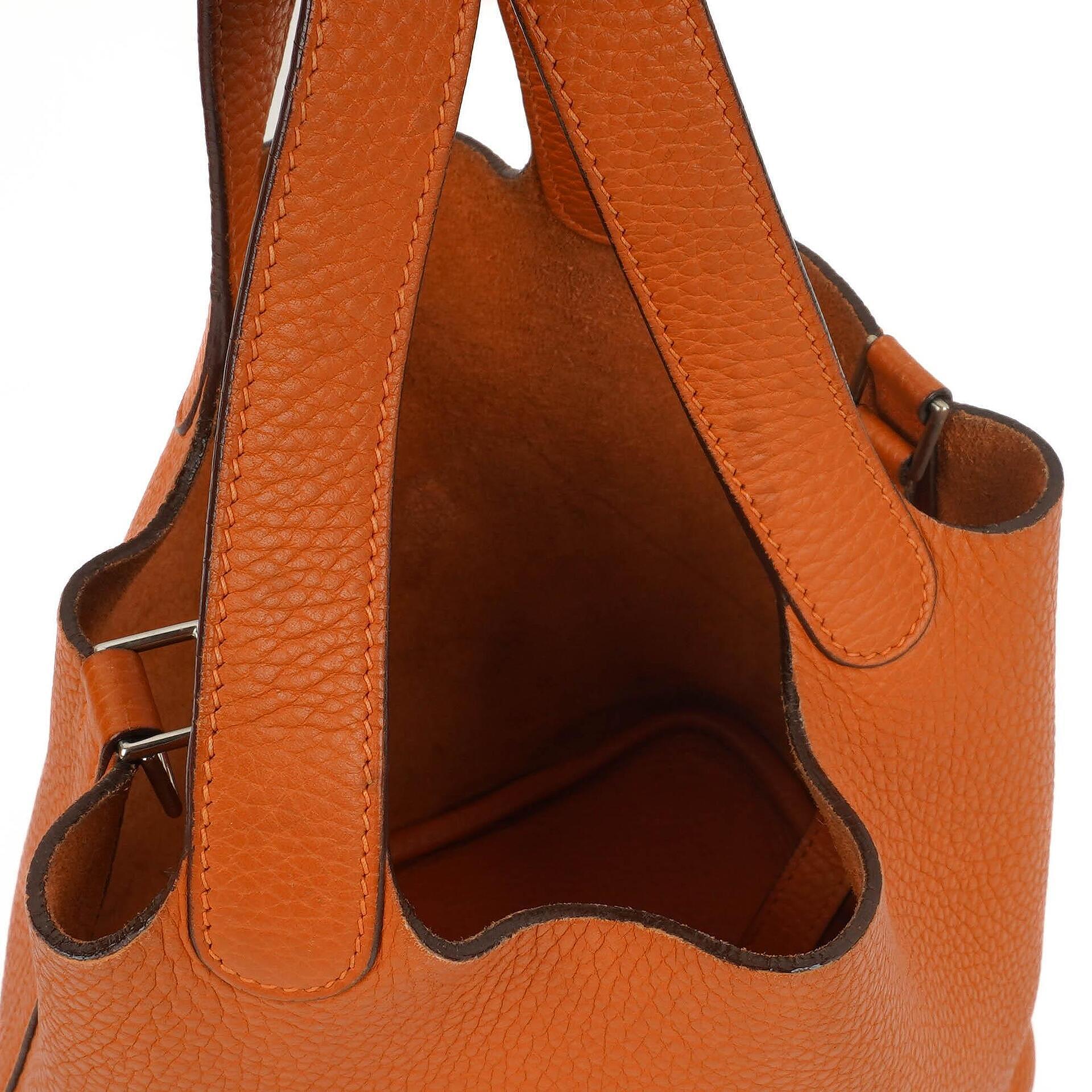 Hermès Picotin 18 PM Bucket Tasche aus orangefarbenem Taurillon Clemence