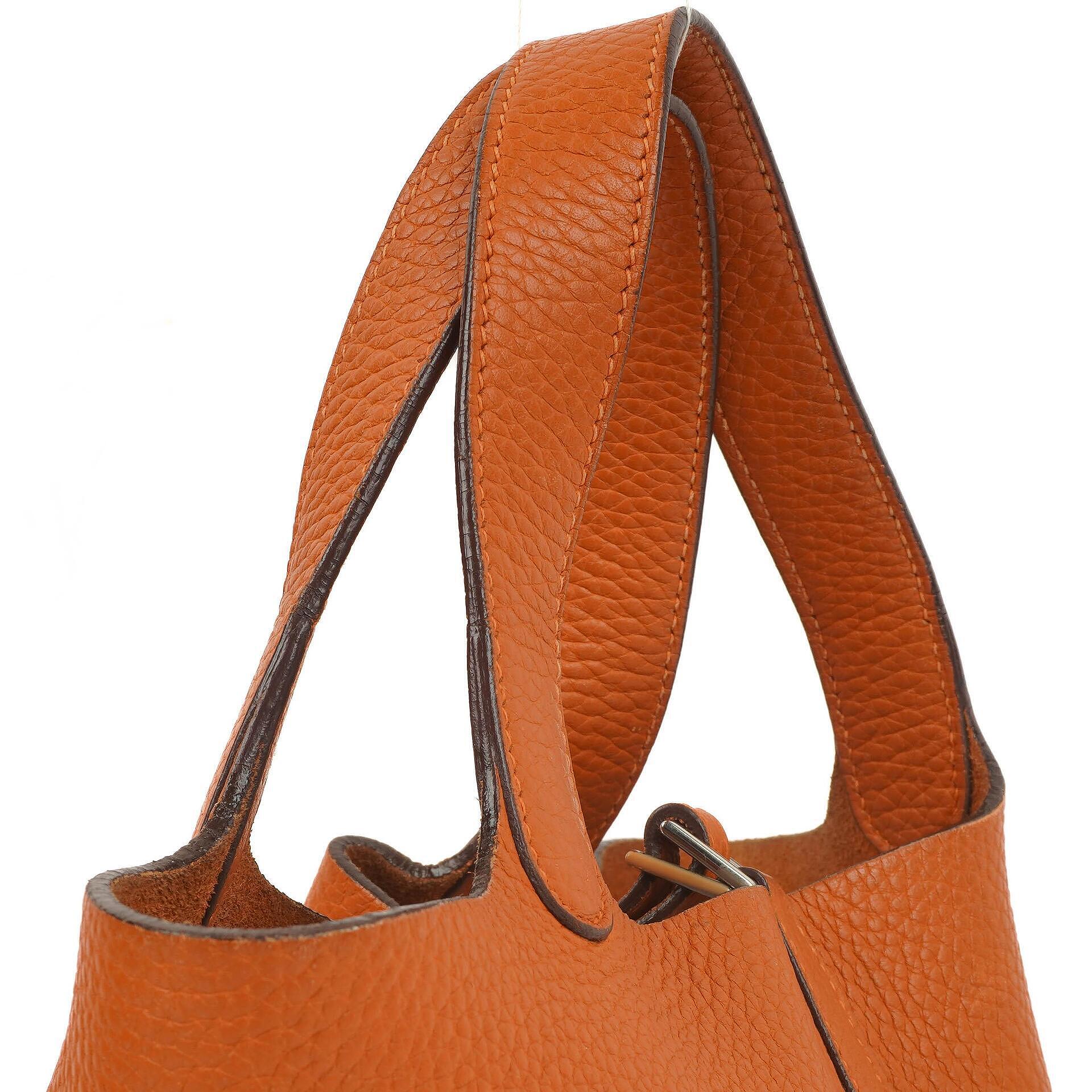 Hermès Picotin 18 PM Bucket Tasche aus orangefarbenem Taurillon Clemence