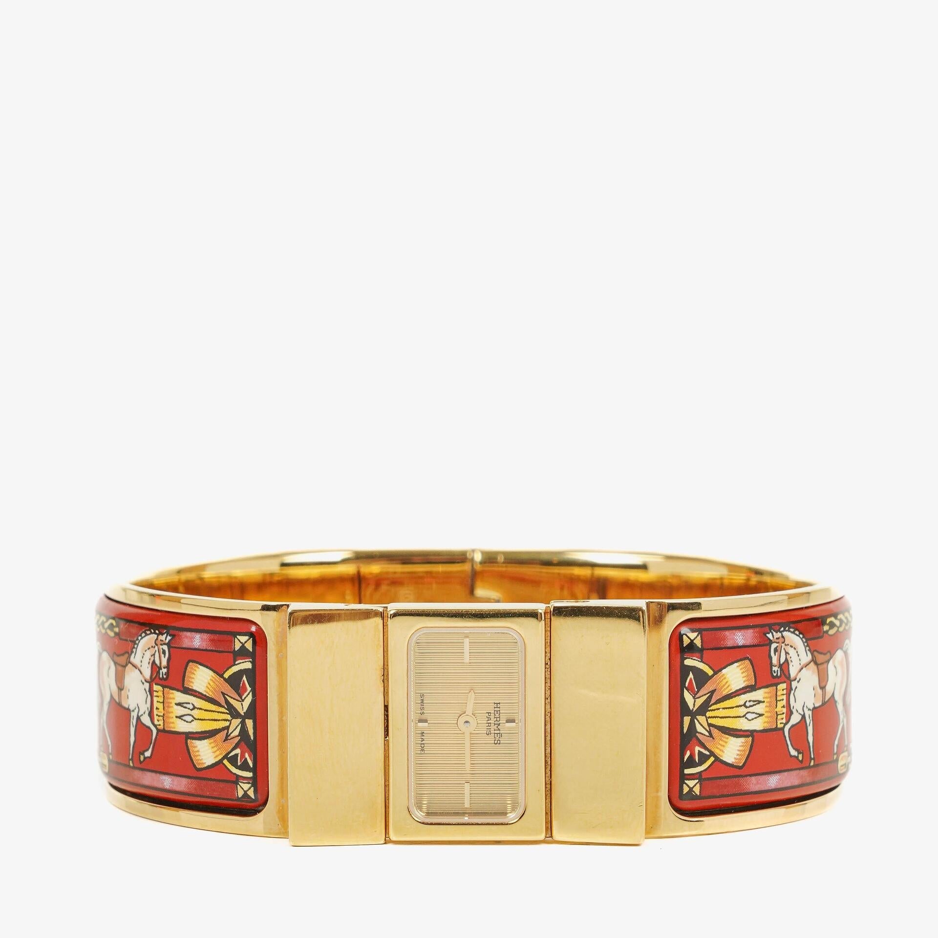 Hermès Loquet Armreif-Quarzuhr L01.200 mit rotem Reiter-Emaille und vergoldeten Details