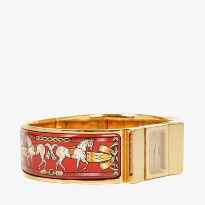 Hermès Loquet Armreif-Quarzuhr L01.200 mit rotem Reiter-Emaille und vergoldeten Details