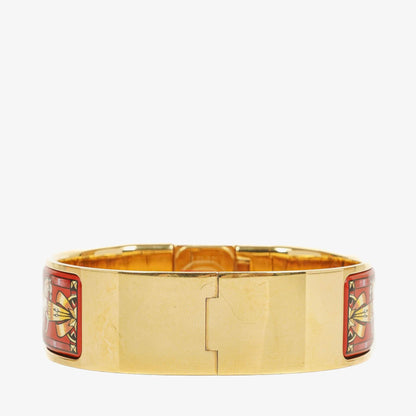 Hermès Loquet Armreif-Quarzuhr L01.200 mit rotem Reiter-Emaille und vergoldeten Details