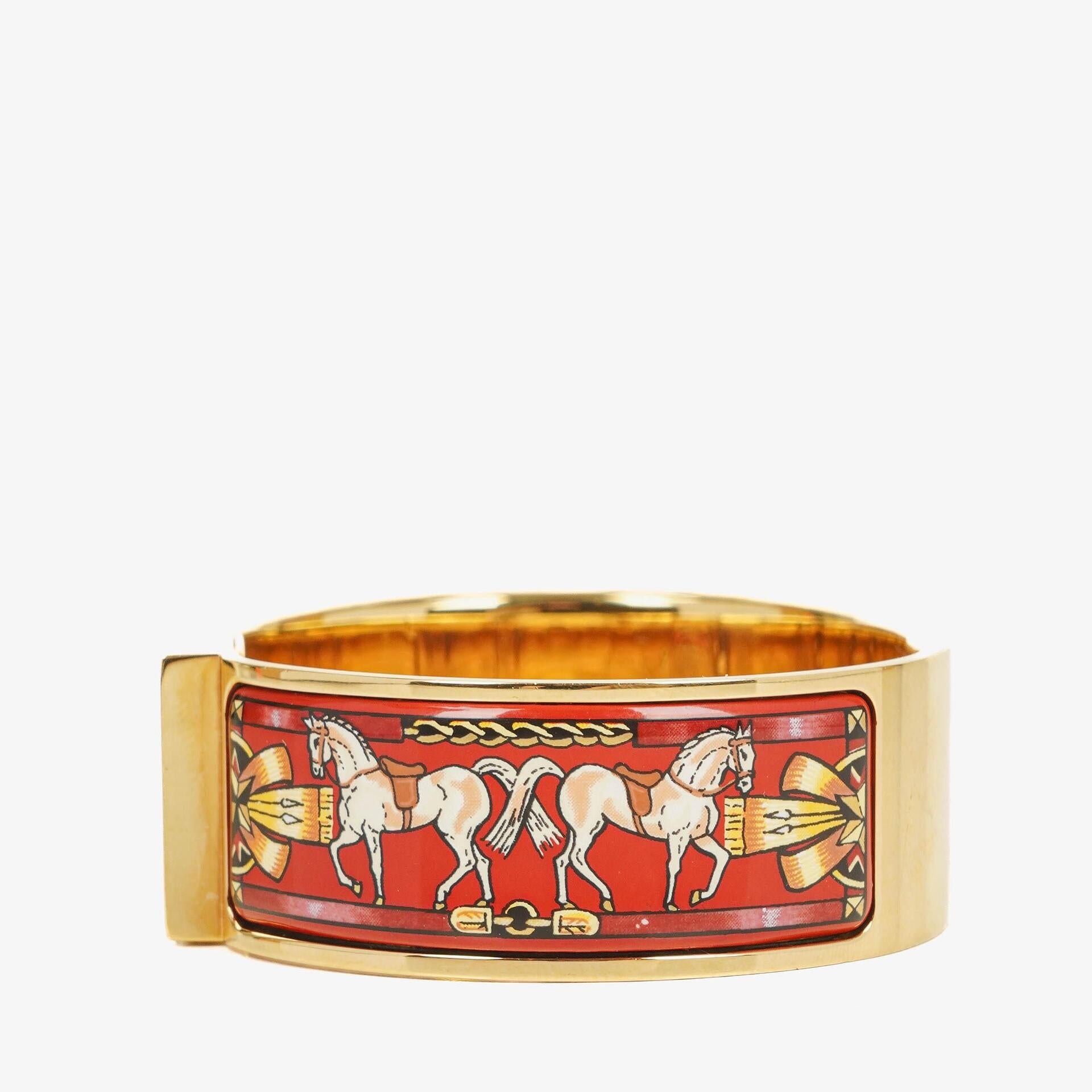 Hermès Loquet Armreif-Quarzuhr L01.200 mit rotem Reiter-Emaille und vergoldeten Details