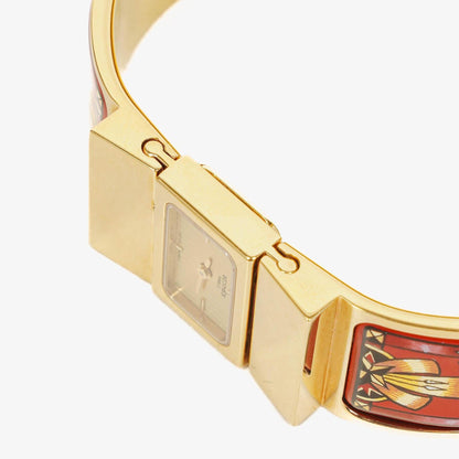 Hermès Loquet Armreif-Quarzuhr L01.200 mit rotem Reiter-Emaille und vergoldeten Details