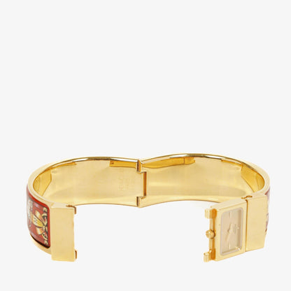 Hermès Loquet Armreif-Quarzuhr L01.200 mit rotem Reiter-Emaille und vergoldeten Details
