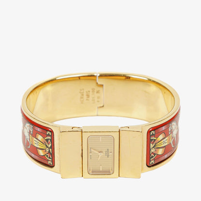 Hermès Loquet Armreif-Quarzuhr mit roter Reitsport-Emaille und vergoldetem Finish, L01.201
