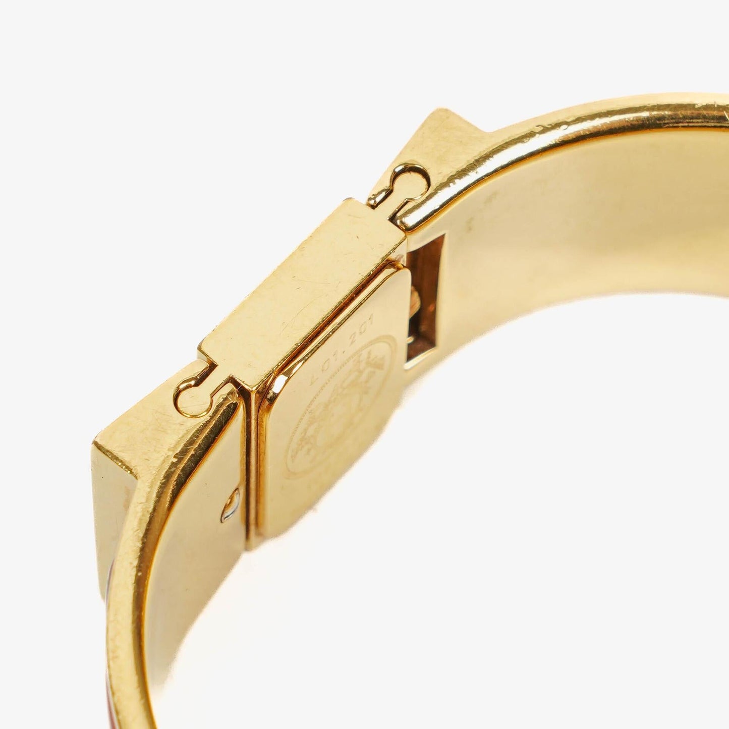 Hermès Loquet Armreif-Quarzuhr mit roter Reitsport-Emaille und vergoldetem Finish, L01.201
