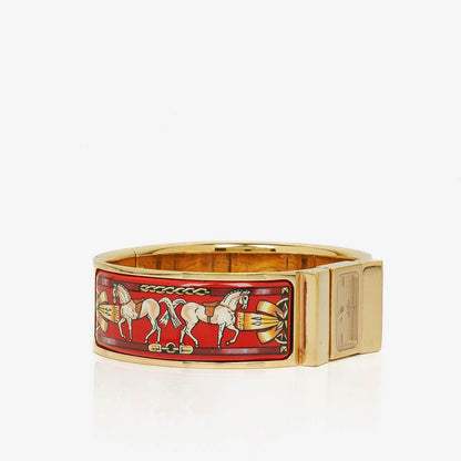 Hermès Loquet L01.201 Quarz-Armreifuhr mit roter Equestrian-Emaille und Vergoldung