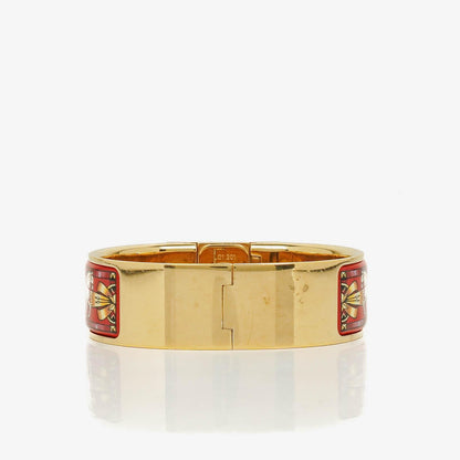 Hermès Loquet L01.201 Quarz-Armreifuhr mit roter Equestrian-Emaille und Vergoldung