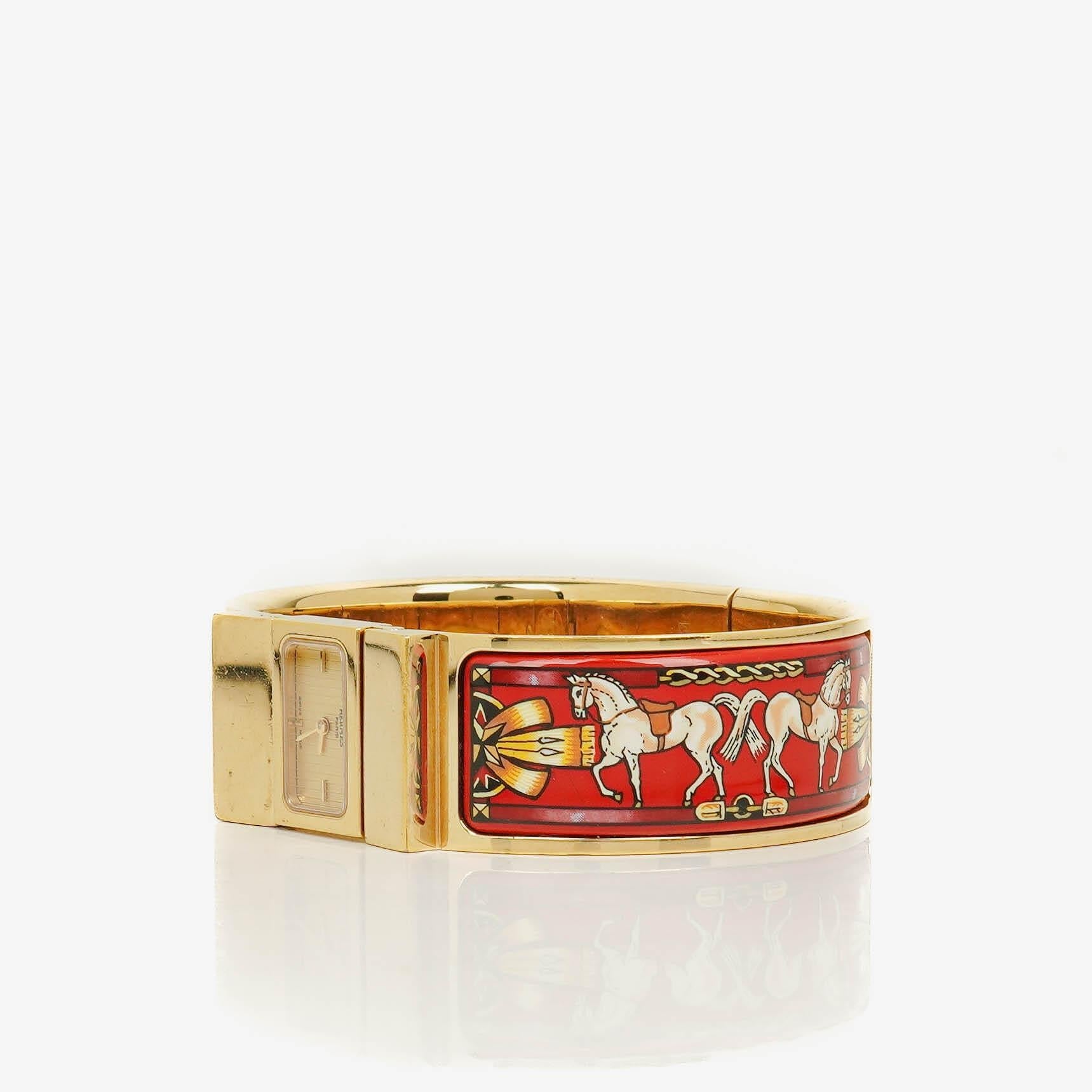 Hermès Loquet L01.201 Quarz-Armreifuhr mit roter Equestrian-Emaille und Vergoldung
