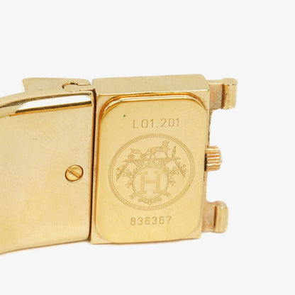 Hermès Loquet L01.201 Quarz-Armreifuhr mit roter Equestrian-Emaille und Vergoldung