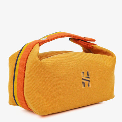 Hermès kleine Bride-A-Brac Pouch aus ockerfarbenem Canvas