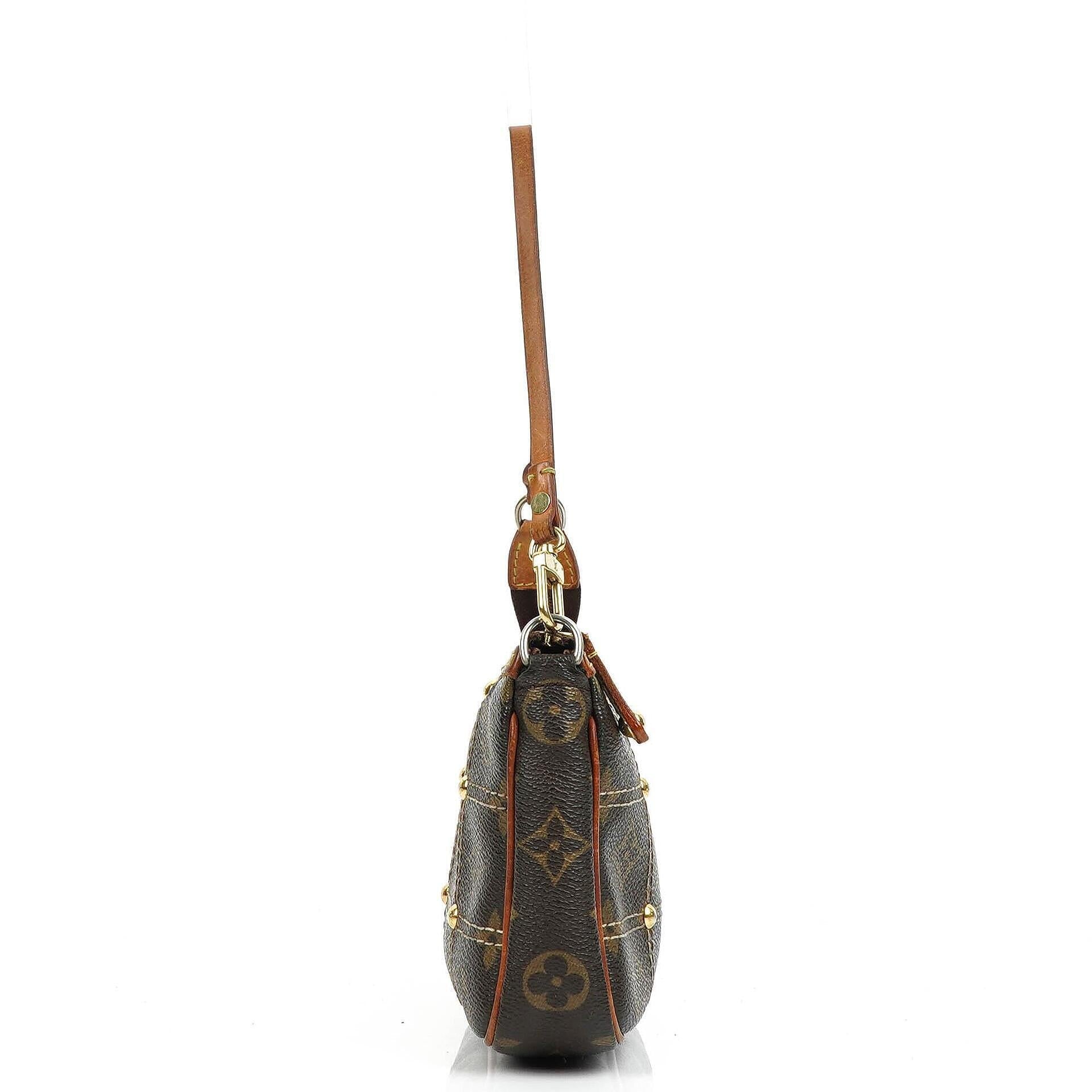 Louis Vuitton Riveting Limited Edition Pochette Accessoires Clutch aus beschichtetem Monogram Canvas