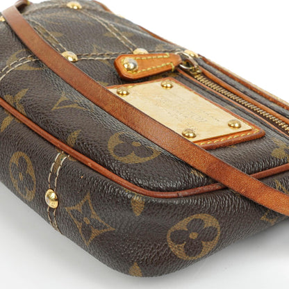 Louis Vuitton Riveting Limited Edition Pochette Accessoires Clutch aus beschichtetem Monogram Canvas