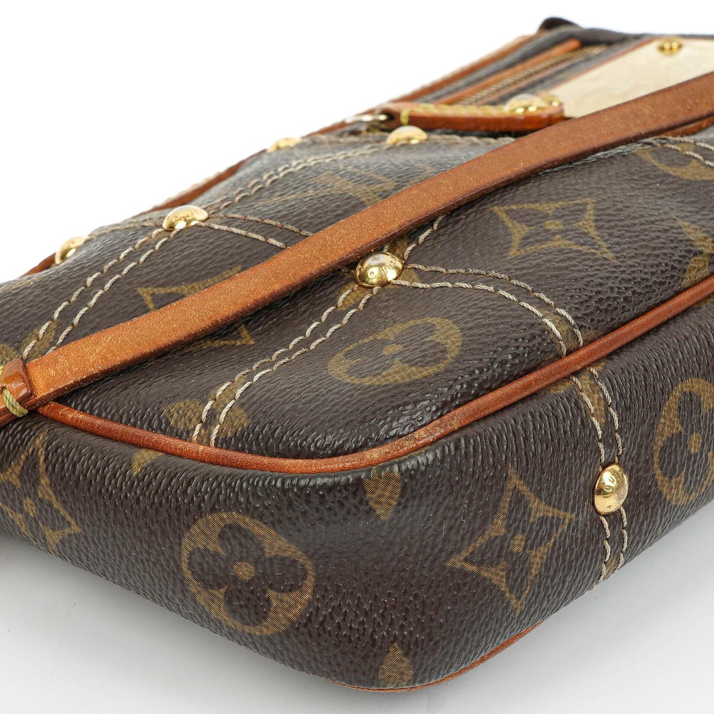 Louis Vuitton Riveting Limited Edition Pochette Accessoires Clutch aus beschichtetem Monogram Canvas