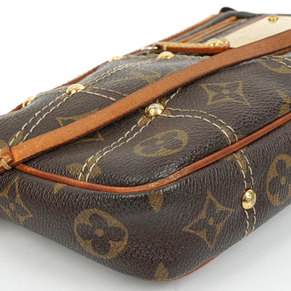 Louis Vuitton Riveting Limited Edition Pochette Accessoires Clutch aus beschichtetem Monogram Canvas