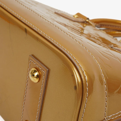 Louis Vuitton Alma BB Gold Poudre Monogram Vernis Leder Handtasche