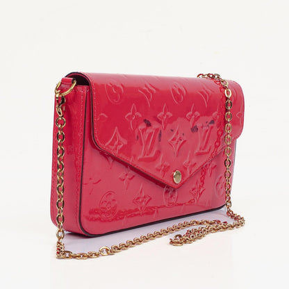 Louis Vuitton Felicie Pochette Kettenbörse aus knallpinkem Vernis