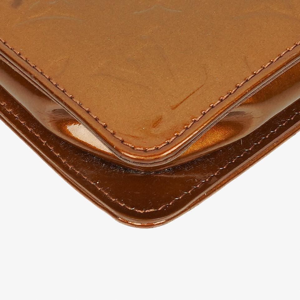 Louis Vuitton Lexington Clutch Tasche aus braunem Monogram Vernis