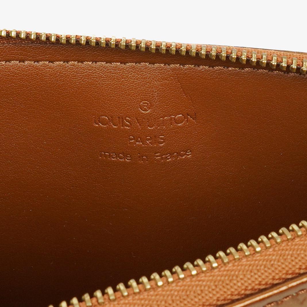 Louis Vuitton Lexington Clutch Tasche aus braunem Monogram Vernis