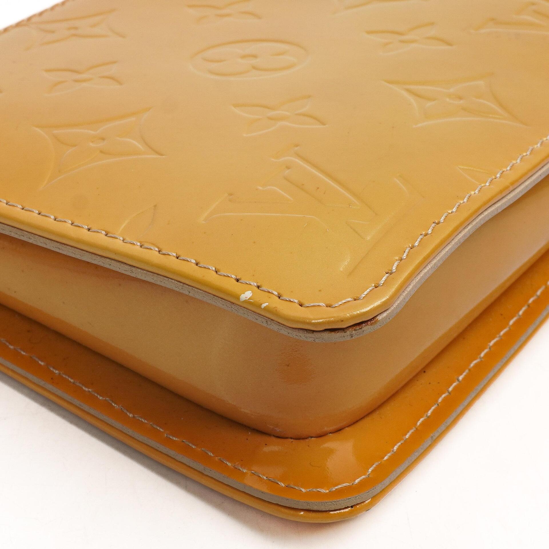 Louis Vuitton Lexington Gelb Monogram Vernis Clutch Handtasche