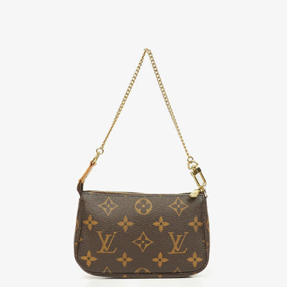 Louis Vuitton Mini Pochette Accessoires Clutch-Handtasche aus Monogram Canvas