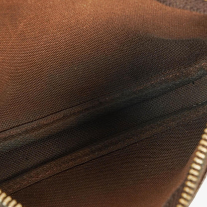 Louis Vuitton Mini Pochette Accessoires aus Monogram Canvas