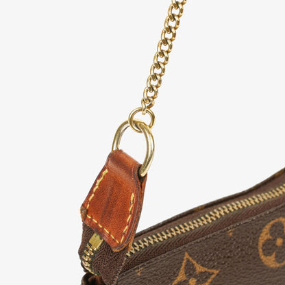 Louis Vuitton Mini Pochette Accessoires aus Monogram Canvas