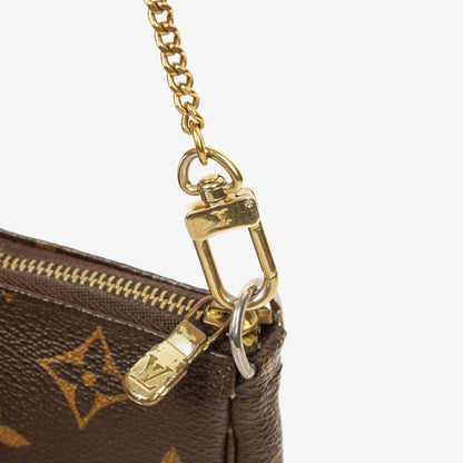 Louis Vuitton Mini Pochette Accessoires aus Monogram Canvas