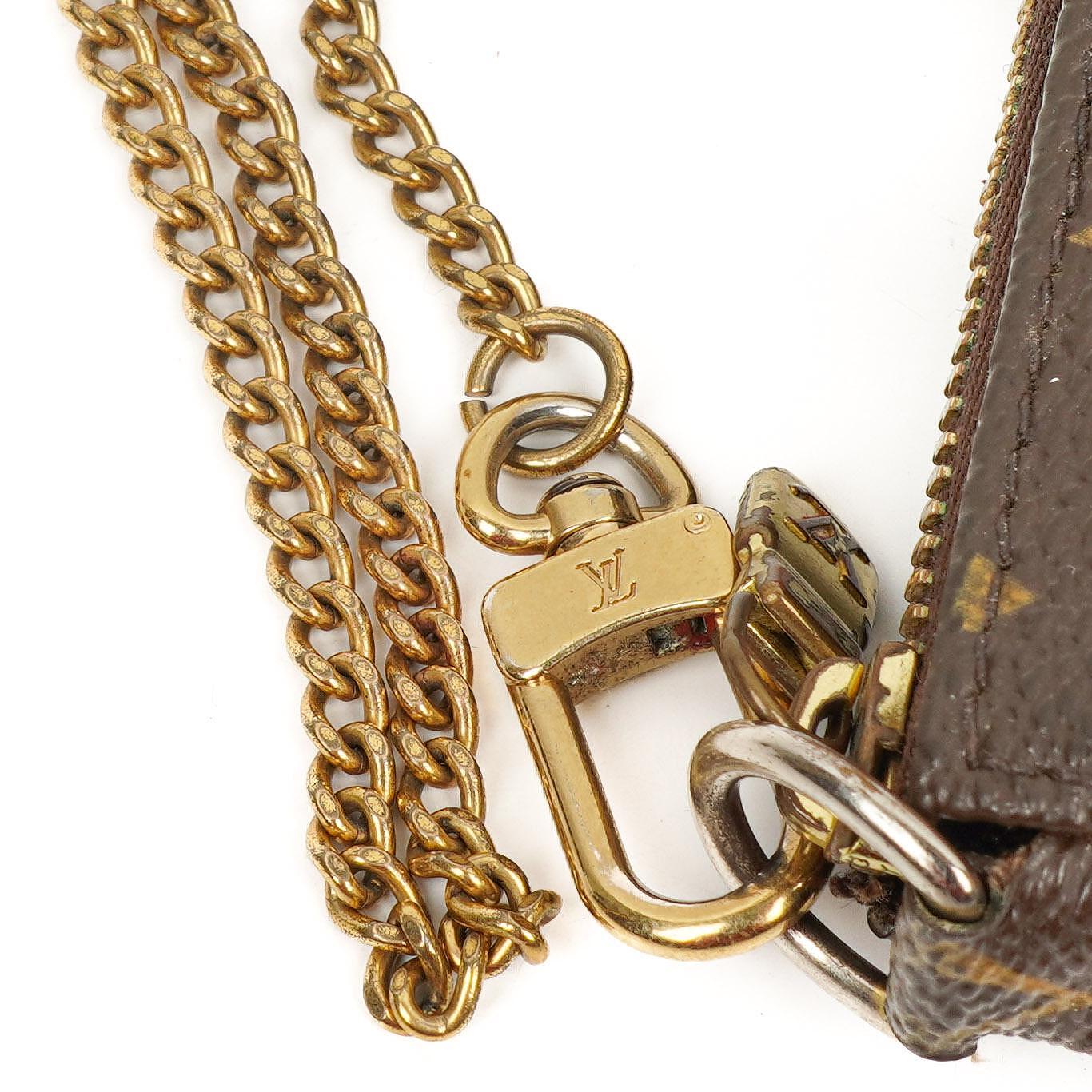 Louis Vuitton Mini Pochette Accessories Monogram Canvas Clutch-Tasche