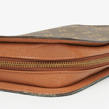 Louis Vuitton Orsay Clutch aus Monogram Canvas