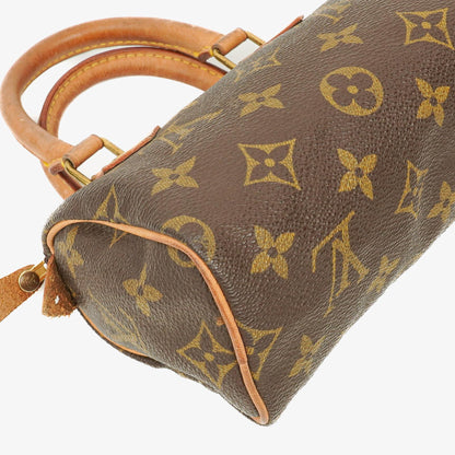 Louis Vuitton Nano Speedy Mini-Tasche aus Monogram Canvas