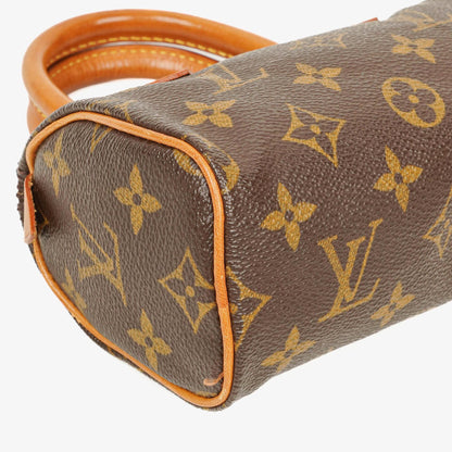 Louis Vuitton Nano Speedy Mini-Tasche aus Monogram Canvas