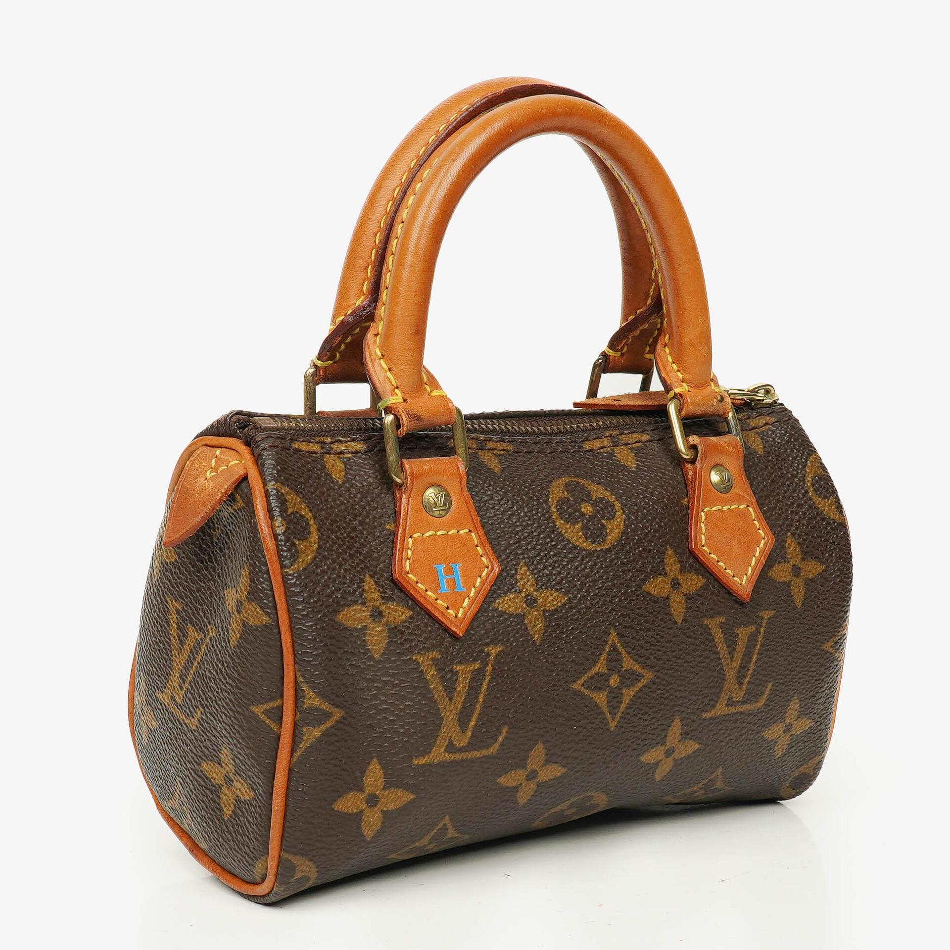 Louis Vuitton Nano Speedy Mini-Tasche aus Monogram Canvas