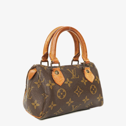 Louis Vuitton Nano Speedy Mini-Tasche aus Monogram Canvas