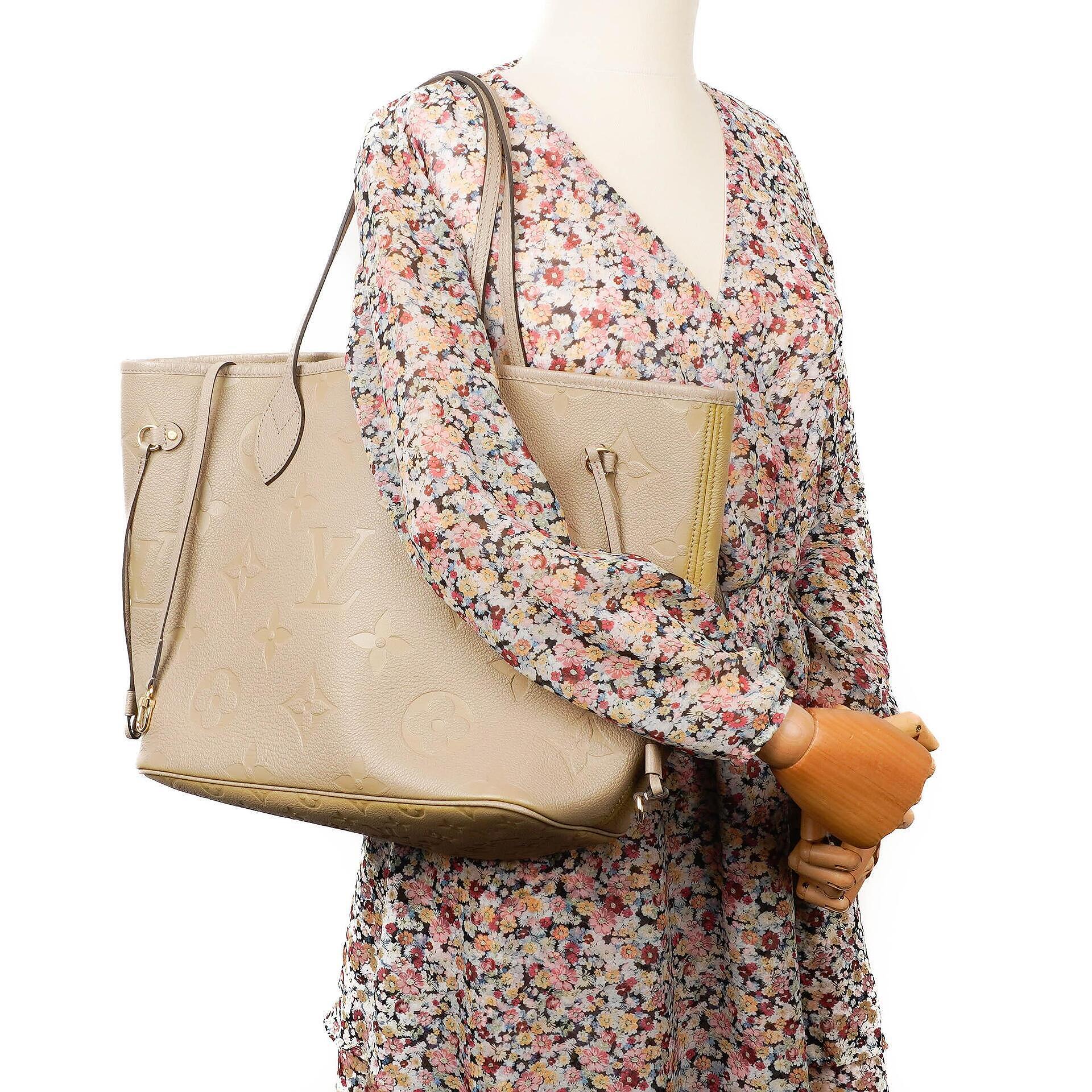 Louis Vuitton Neverfull MM Tragetasche aus beigem Empreinte Leder