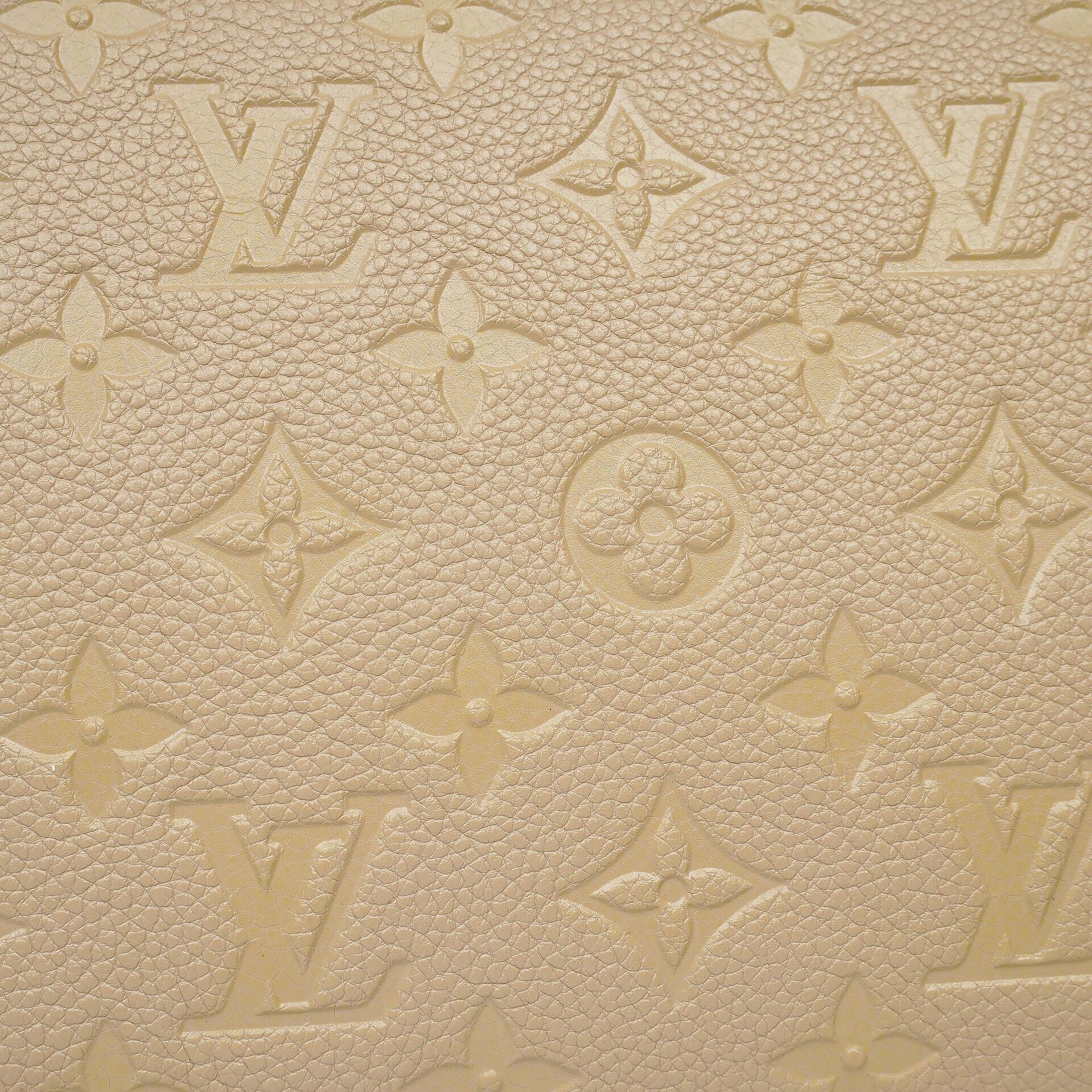Louis Vuitton Neverfull MM Tragetasche aus beigem Empreinte Leder