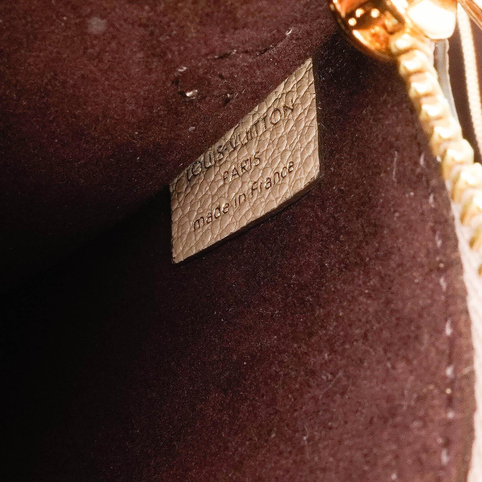 Louis Vuitton Neverfull MM Tragetasche aus beigem Empreinte Leder