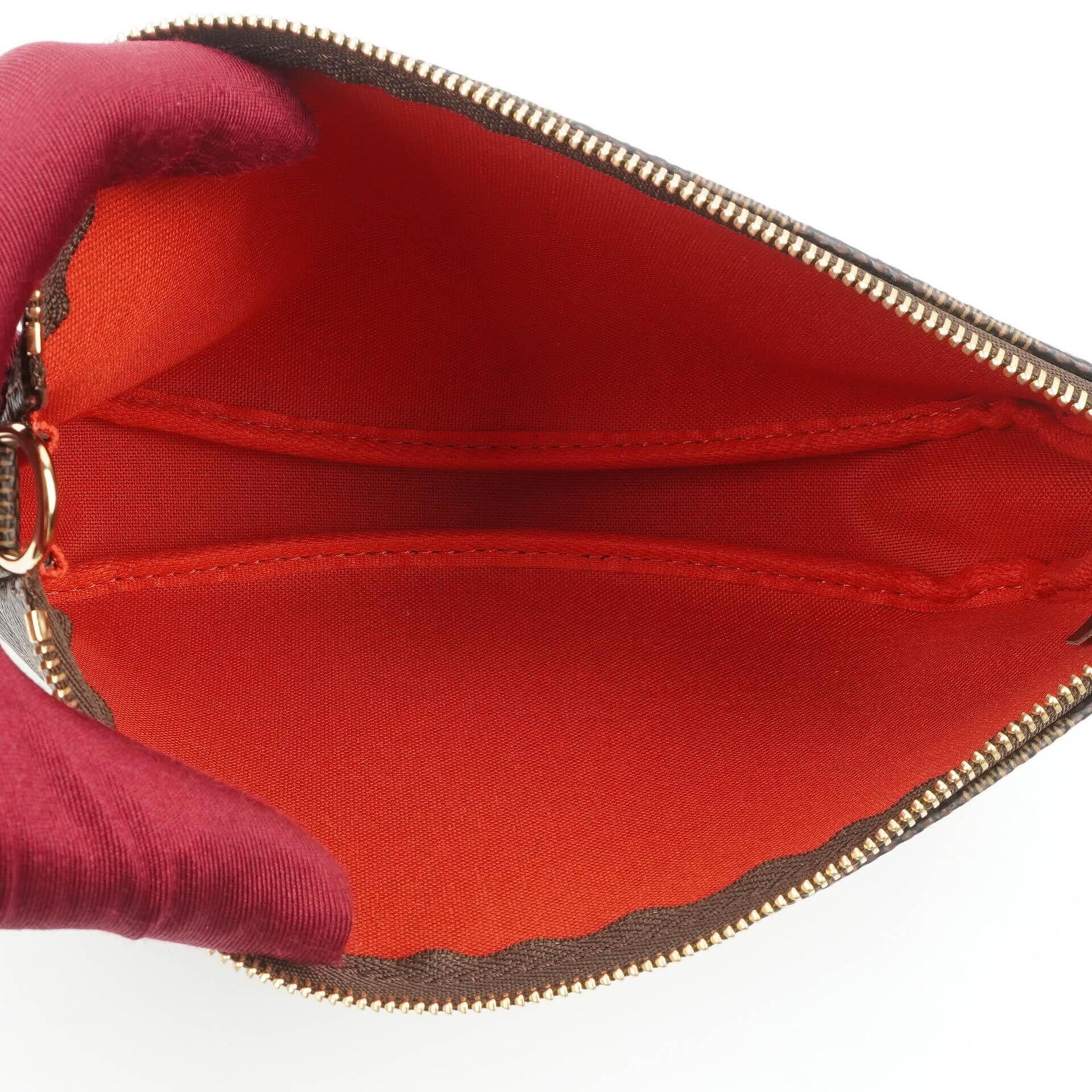 Louis Vuitton Pochette Accessoire Clutch-Handtasche aus Damier Ebène Canvas