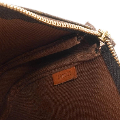 Louis Vuitton Pochette Accessoires Monogram Canvas Clutch Tasche
