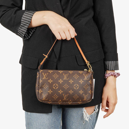 Louis Vuitton Pochette Accessoires Clutch aus Monogram Canvas