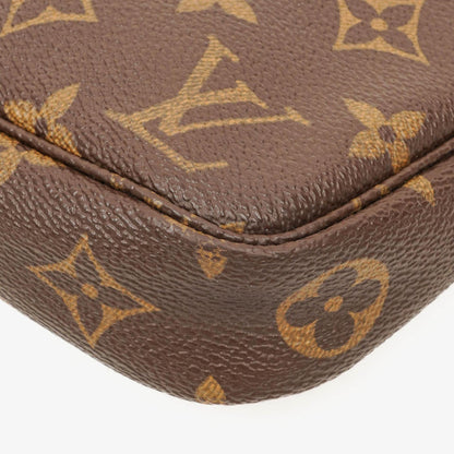 Louis Vuitton Pochette Accessoires Clutch aus Monogram Canvas