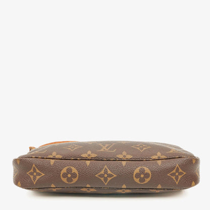 Louis Vuitton Pochette Accessoires Clutch aus Monogram Canvas