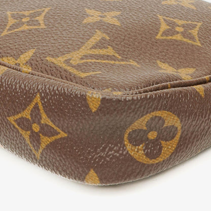 Louis Vuitton Pochette Accessoires Clutch aus Monogram Canvas