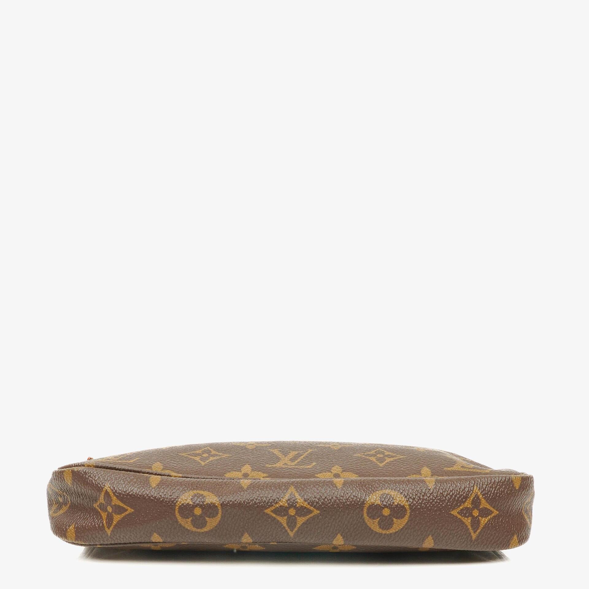 Louis Vuitton Pochette Accessoires Clutch aus Monogram Canvas