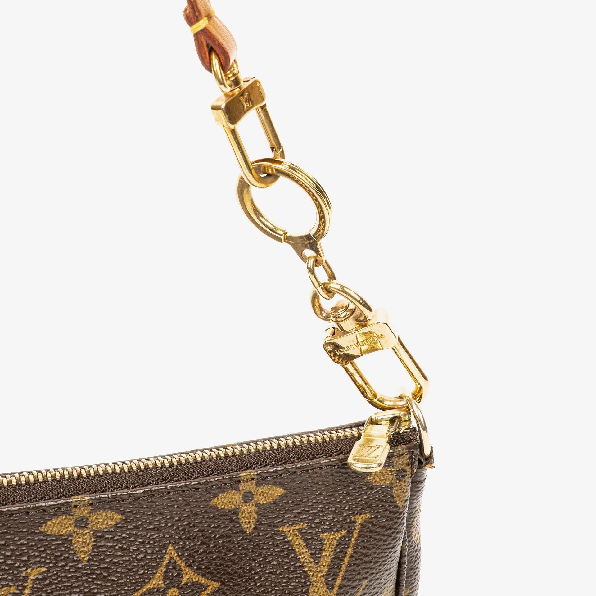 Louis Vuitton Pochette Accessoires Clutch aus Monogram Canvas